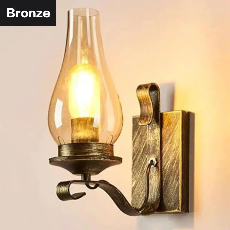 Bronze wall sconce lamp with curved arm and Edison bulb, industrial rustic style
