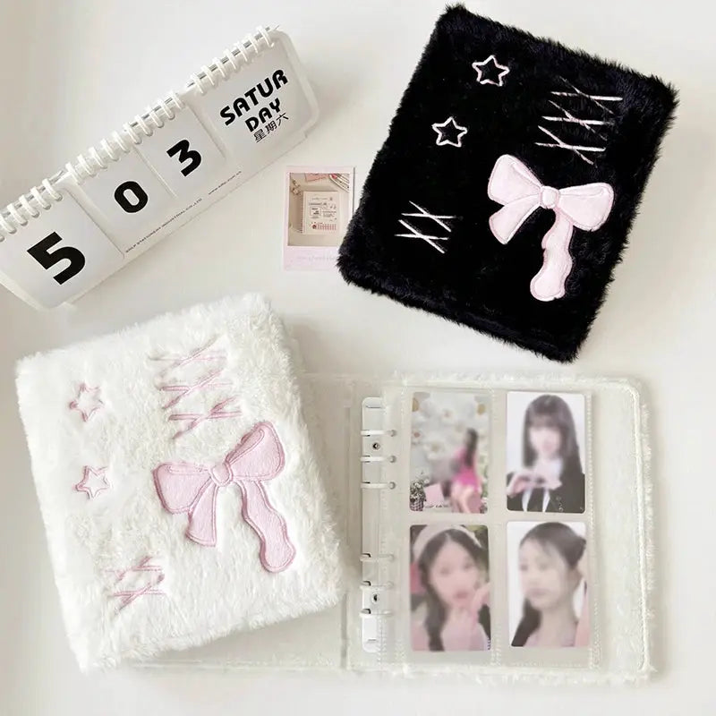 Bow Korea plush A6 photocard binder set of 2 by Simples Market; white and black fuzzy covers with pink bow and photo sleeves