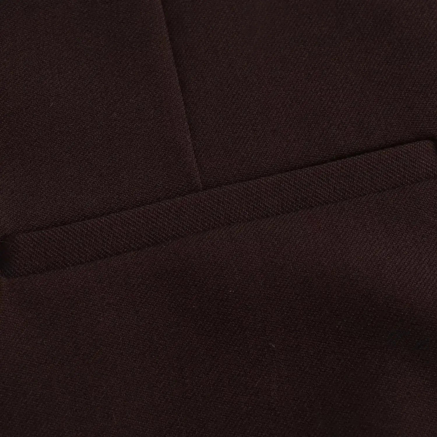 KONDALA blazer fabric close-up in dark brown with seam and edge trim.