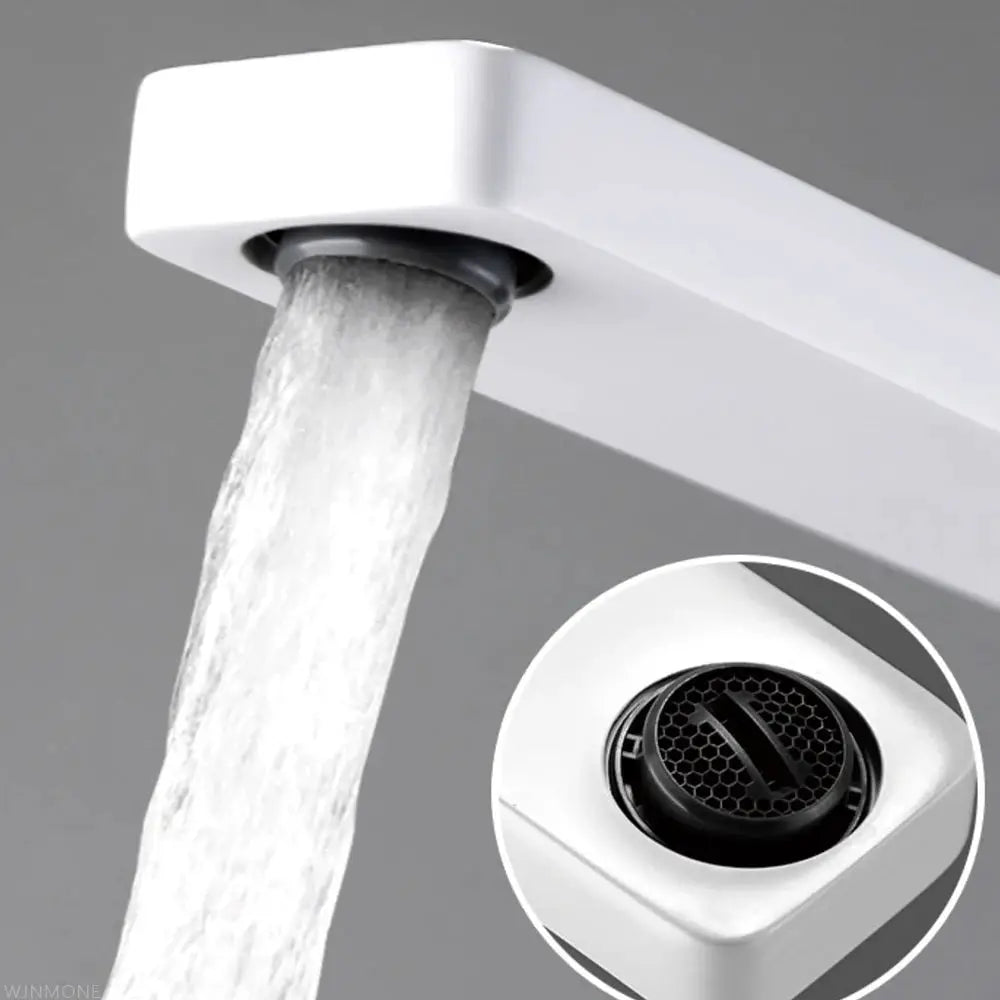 Modern white basin faucet with single-handle design for grey washbasin