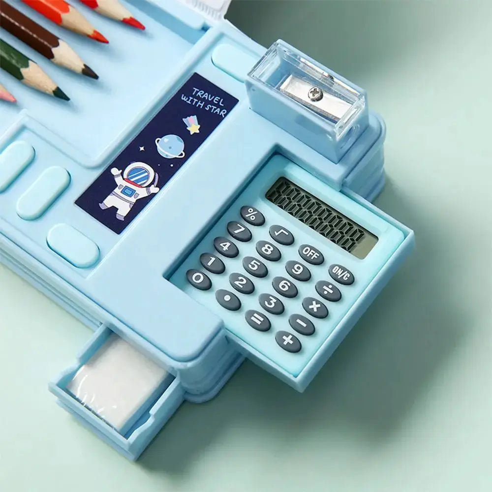 Simples Market blue plastic double-layer pencil case with built-in sharpener and calculator, space/astronaut design.