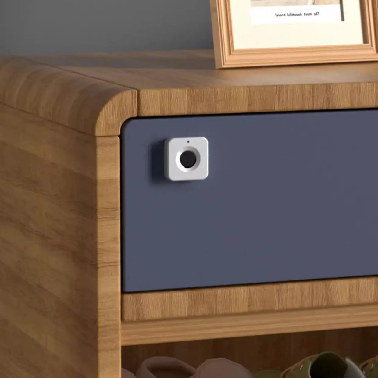 KAK biometric fingerprint lock, white 30x30mm, mounted on a blue wooden cabinet drawer