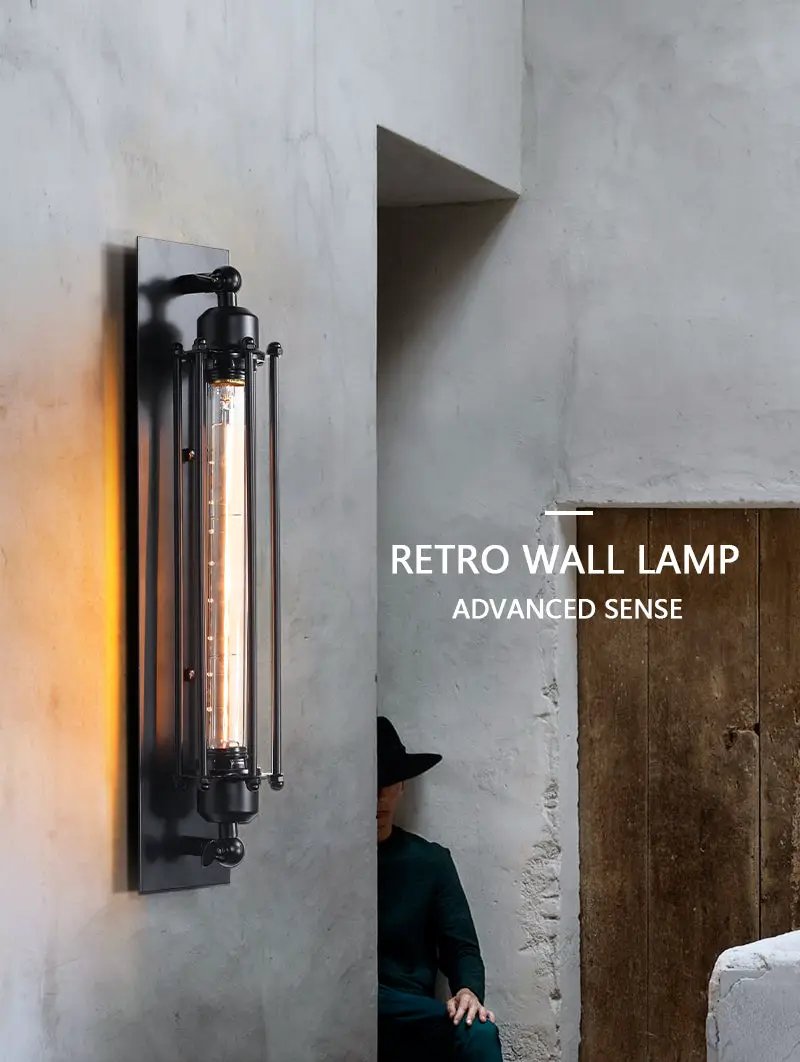 Retro industrial iron wall light with black finish and exposed LED tube, warm glow.