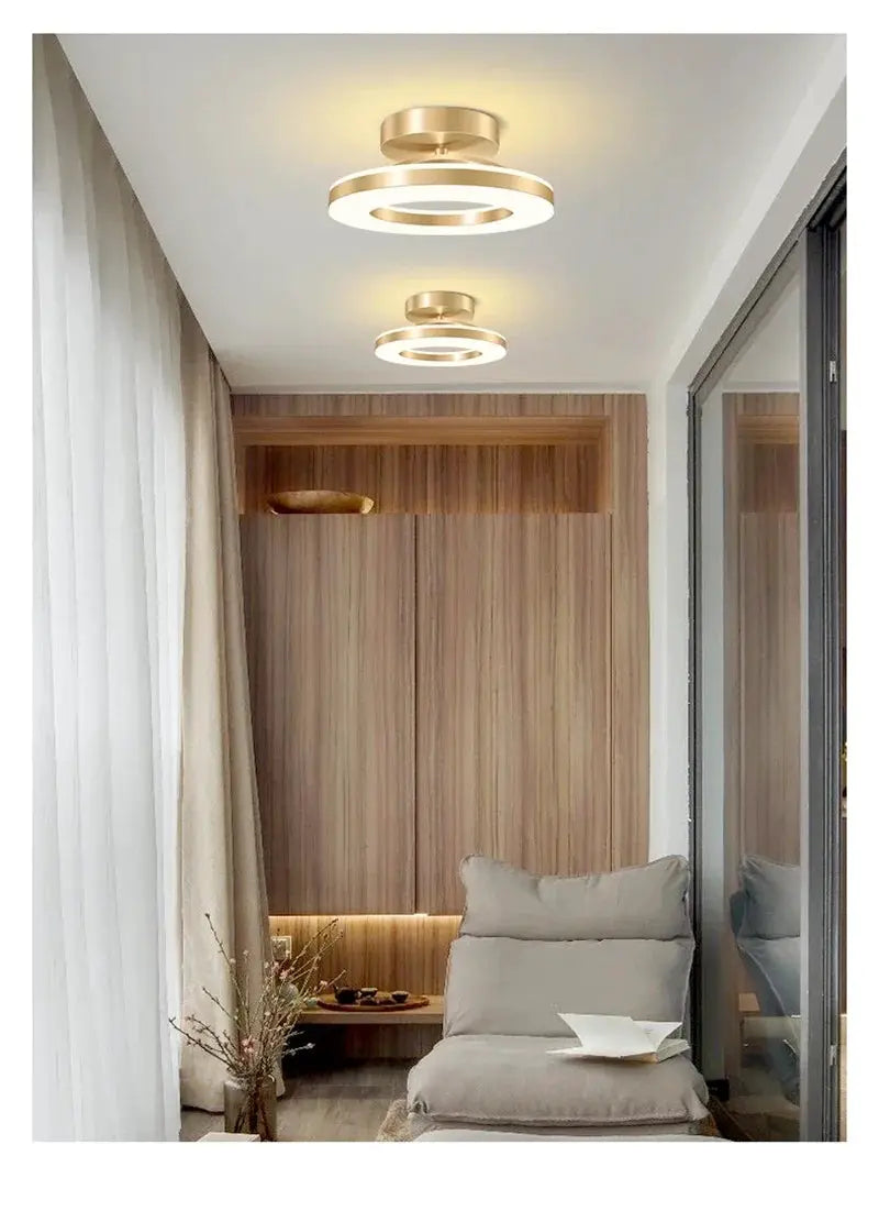 Modern LED ceiling lamp with gold ring design by Simples Market, two circular lights