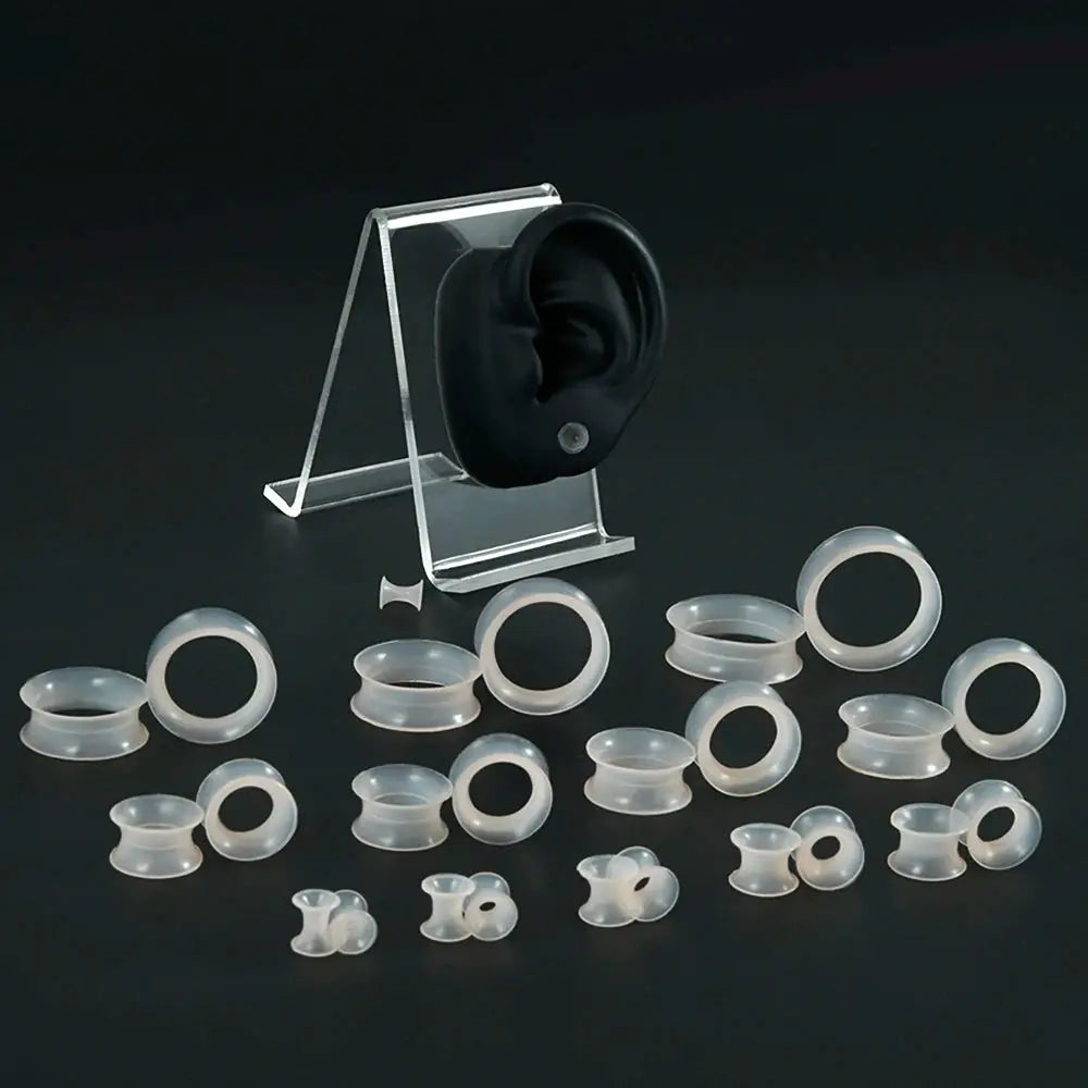 Clear silicone ear tunnels set for stretched ears; thin, soft, flexible double-flare plugs in multiple sizes