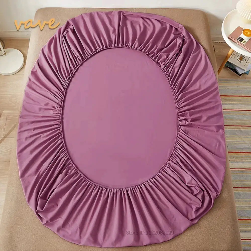 Full-size cotton fitted sheet with elastic bands in purple, designed for a snug fit over the mattress.