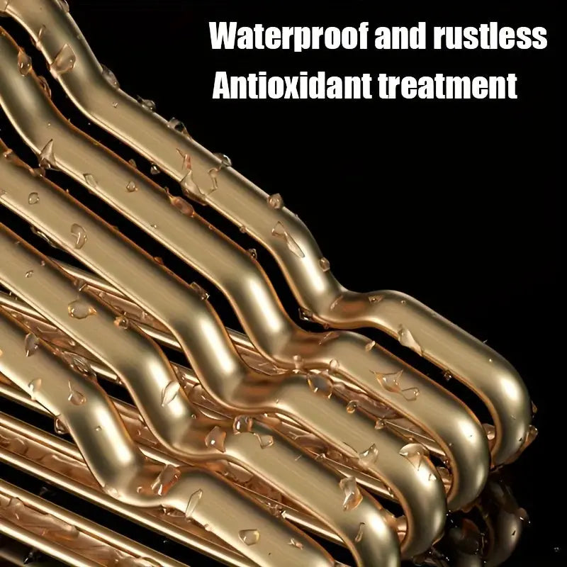 Set of golden aluminum alloy coat hangers.