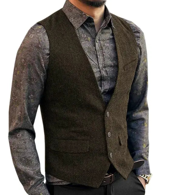 Deep V-neck herringbone waistcoat in brown worn over a patterned shirt; slim-fit men's vest