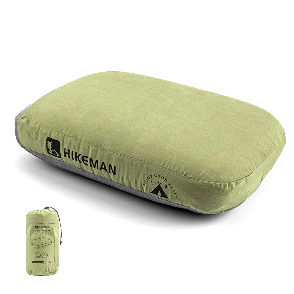 HIKEMAN memory foam camping pillow in light green; neck support for outdoor travel with carrying bag