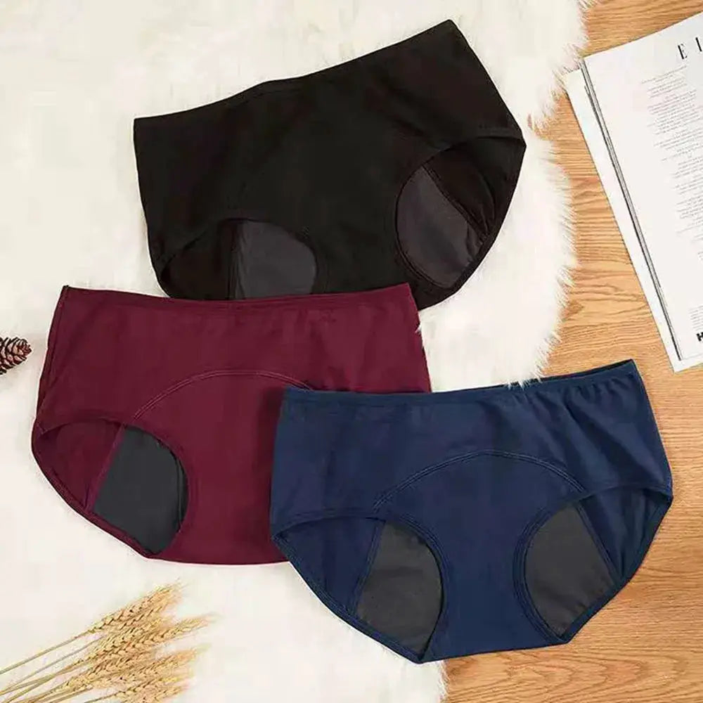 Simples Market period underwear set: three low-waist breathable cotton briefs in black, maroon, and navy.