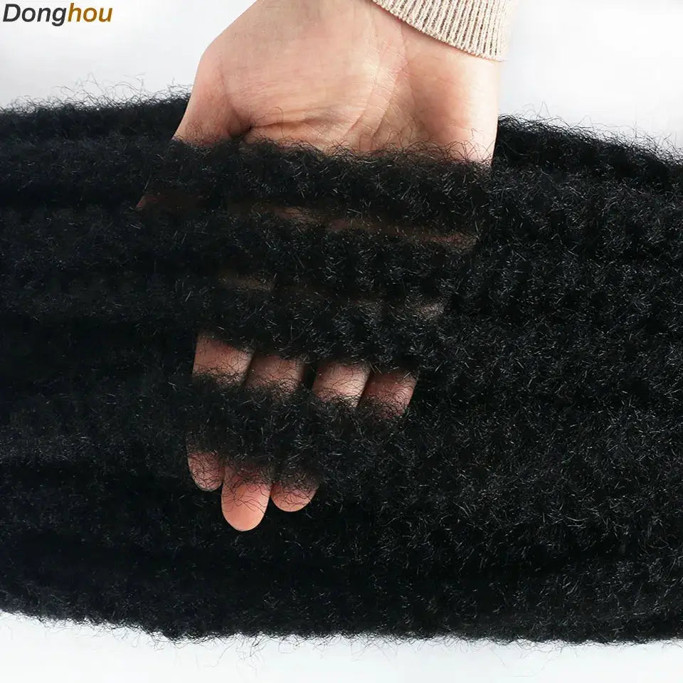 Marley Hair 18-inch synthetic braiding hair in black, held by hand to show thick kinky curls with a Donghou watermark