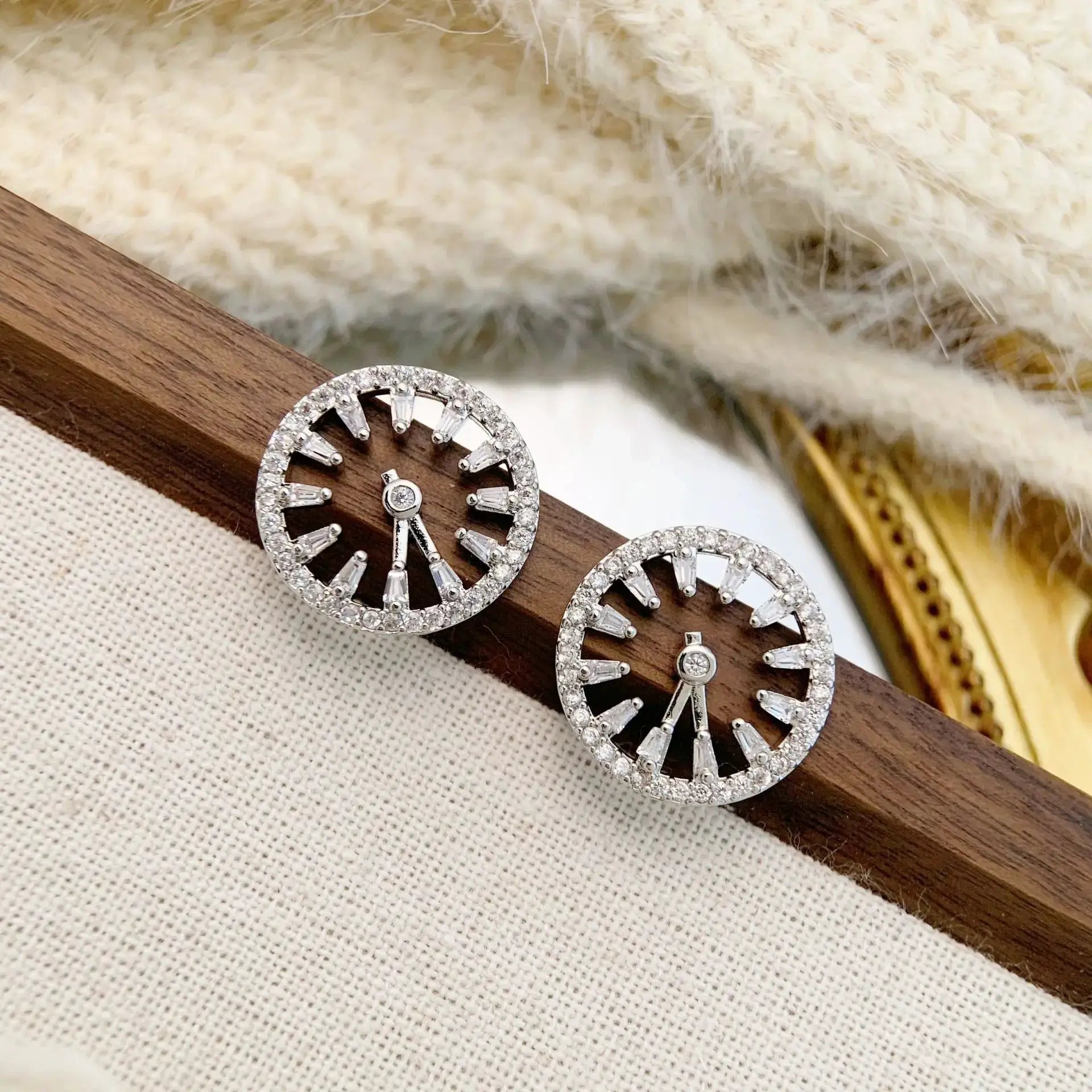Set of three silver-tone round clock earrings encrusted with crystals, vintage-style jewelry