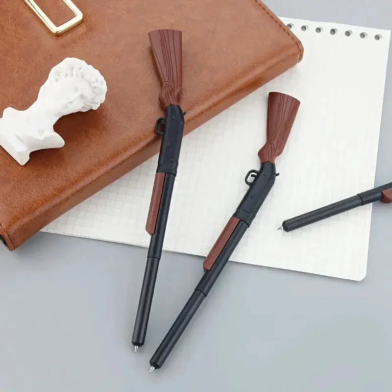 Gun pen set by Simples Market, two black ballpoint pens with brown accents