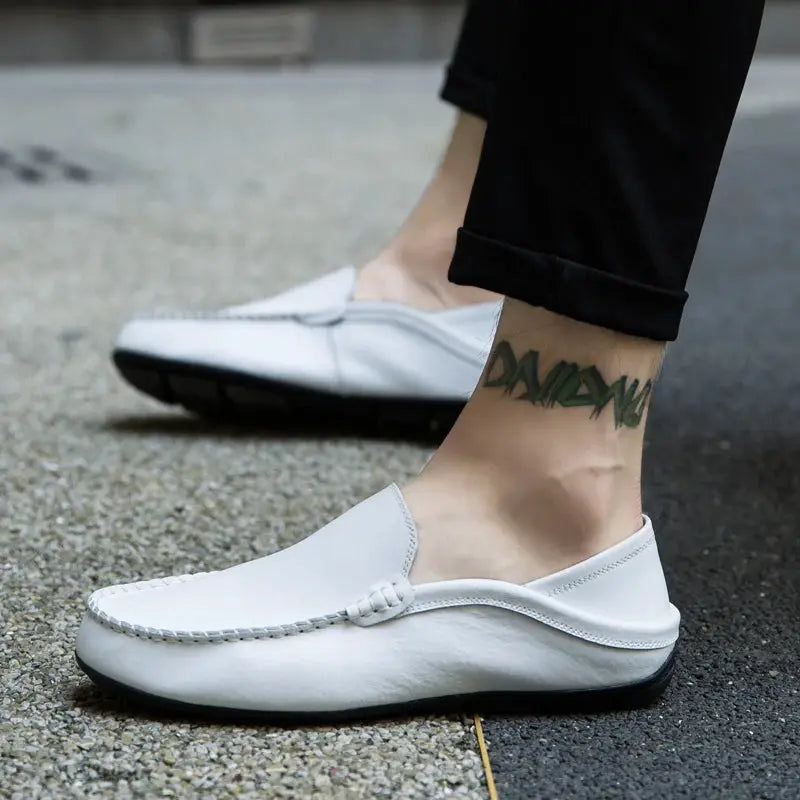 Men's white genuine leather loafers with moccasin stitching and black sole
