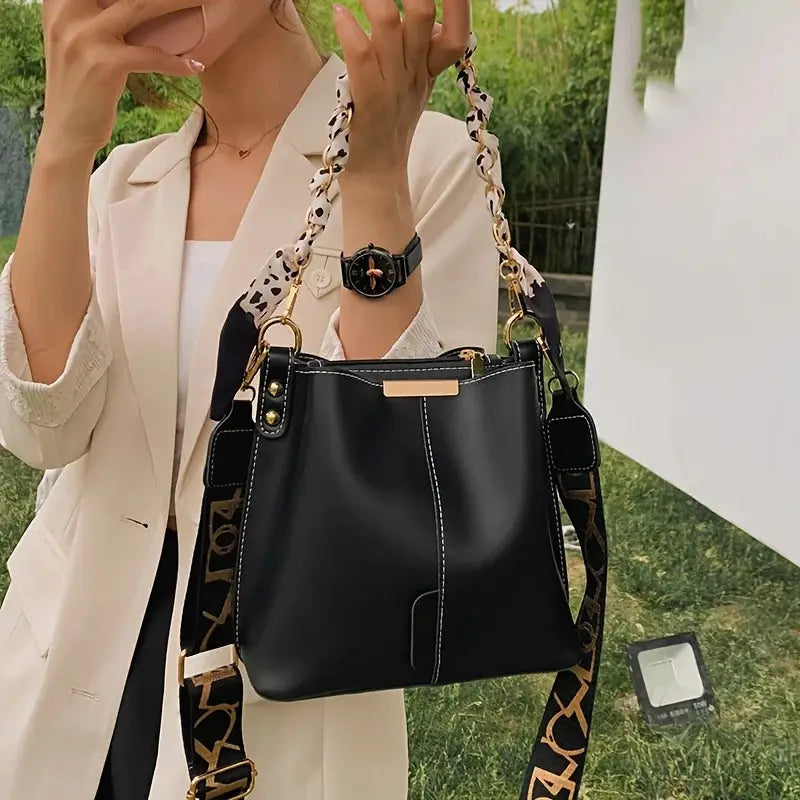 Black bucket bag with ribbon chain strap, large capacity crossbody for daily commuting