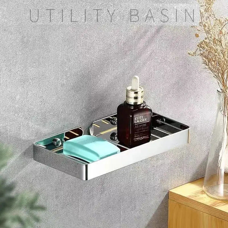 Stainless steel bathroom shelf wall-mounted organizer with chrome finish, holding soap, sponge and bottle