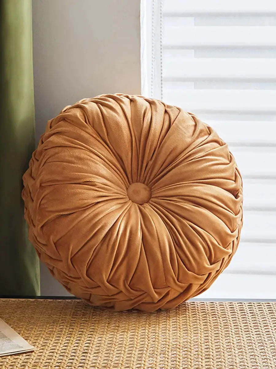 Pumpkin-shaped lumbar throw pillow in camel Dutch velvet with hand-sewn 3D pleats