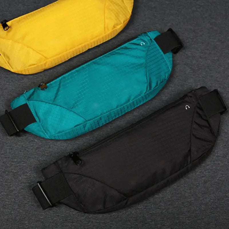 3 fanny packs in yellow, teal, and black; lightweight waist bags.