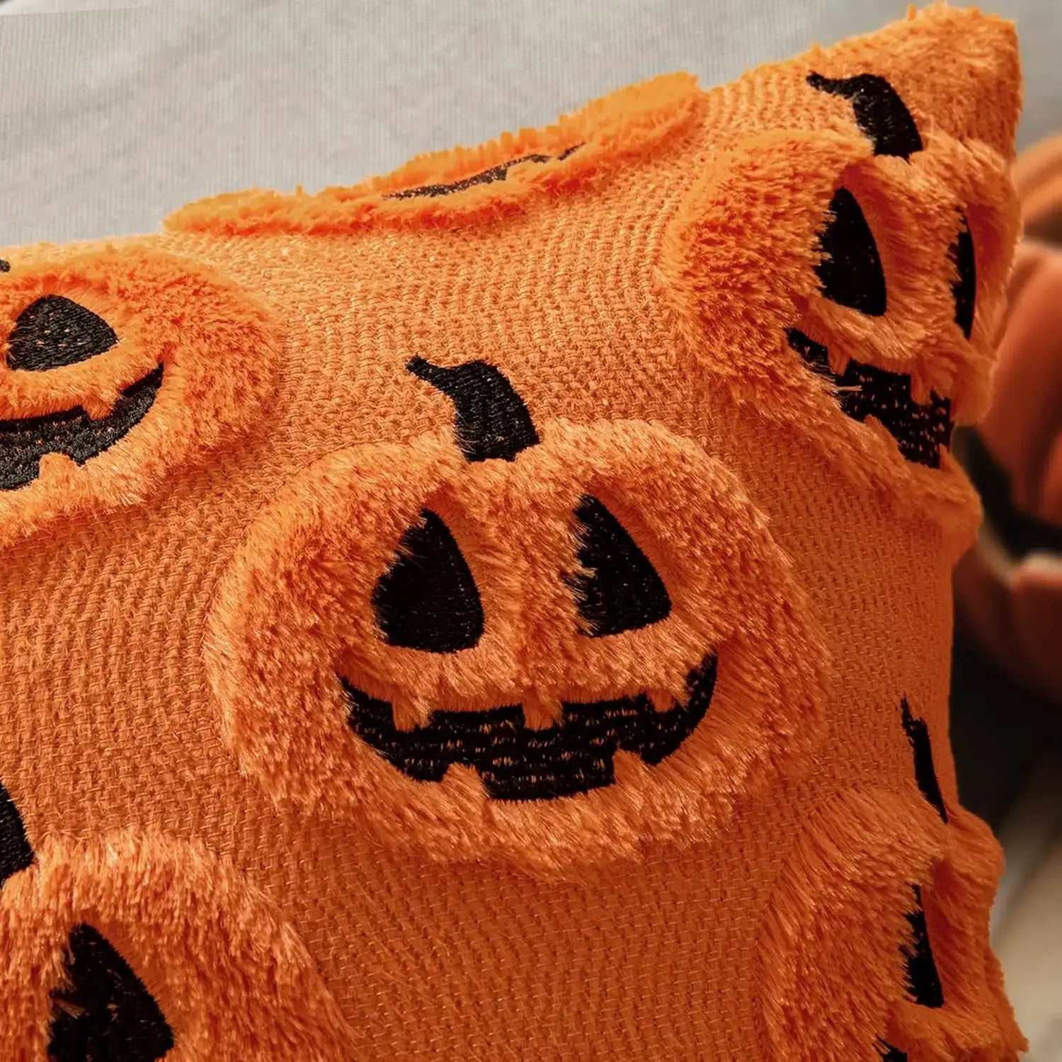 Halloween pumpkin pillow cover, orange plush fabric with black jack-o-lantern faces, 45x45, Simples Market