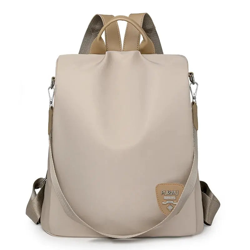 Women's anti-theft beige backpack with adjustable straps and large-capacity travel design by Simples Market