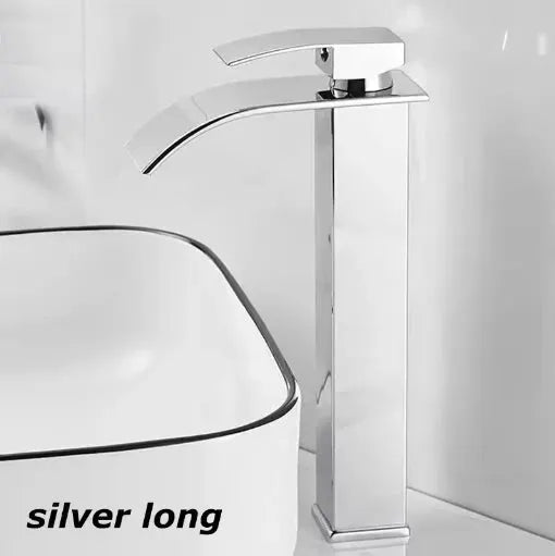 Chrome waterfall wash-basin faucet with tall square base for a modern bathroom