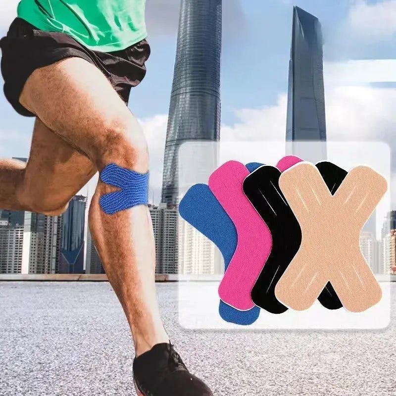 Kinesiology tape set by Simples Market; blue knee tape with pink, black and beige rolls nearby.