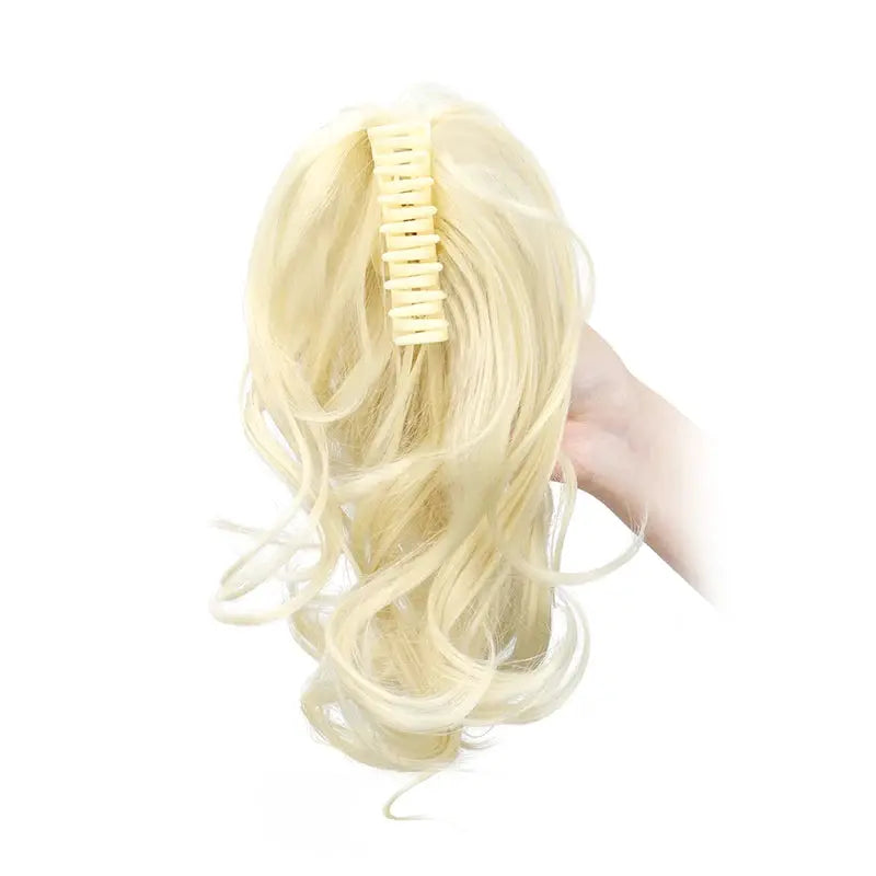 12-inch synthetic ponytail clip-in extension, blonde, curled with beige claw clip