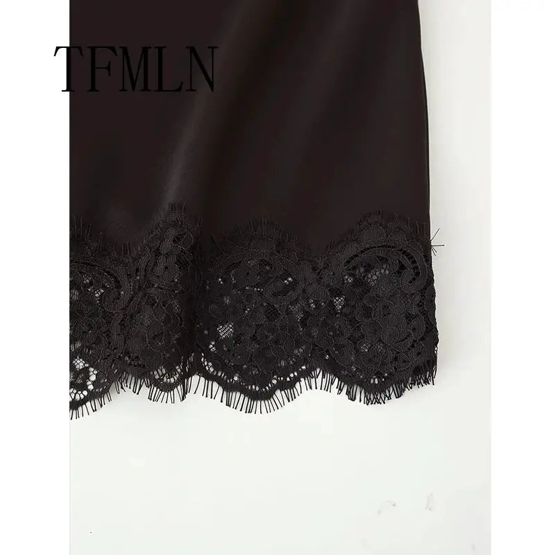 Black satin wrap-around long skirt with scalloped lace hem.