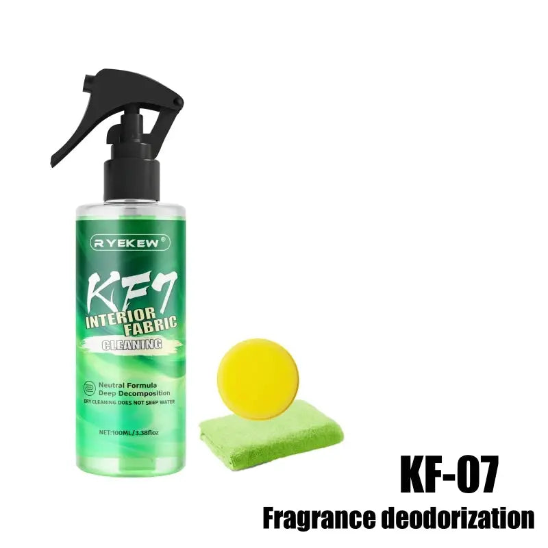 Ryekew car interior cleaner spray bottle with green label and black nozzle, sponge and yellow pad beside