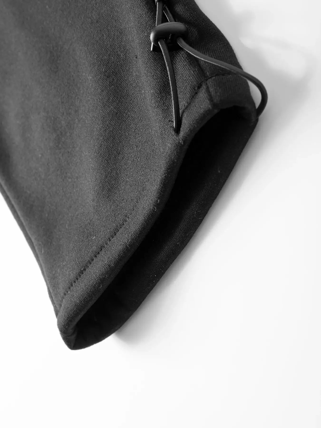 Men's black sweatpants with drawstring waist; straight loose-fit joggers.