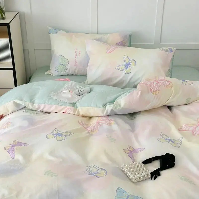 Pink pastel butterfly bedding set with duvet cover, flat sheet and pillowcases for girls