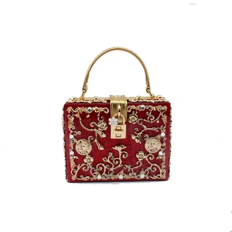Crystal evening bag with red velvet body, gold hollow-out floral metalwork and diamond accents