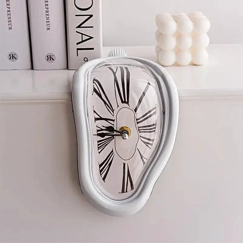 Melting wall clock by Simples Market, Dalí-inspired silver frame with Roman numerals for decorative home or office shelf