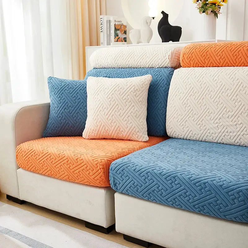 Sofa slipcover set by Simples Market in orange and blue jacquard with matching cushions