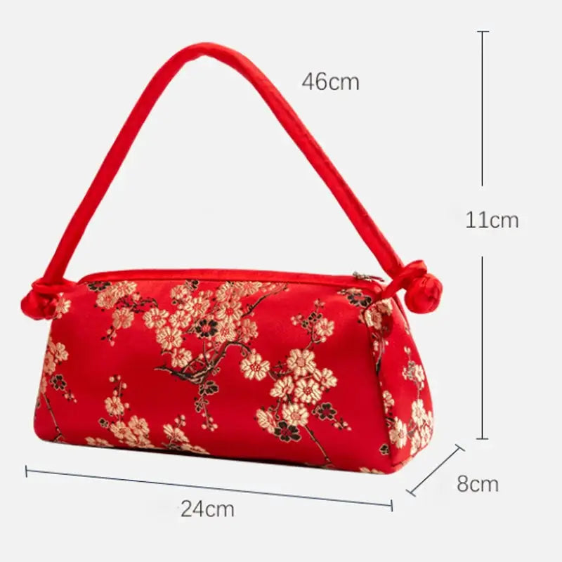 Simples Market red satin shoulder bag with embroidered cherry blossom flowers; compact 24x8x11 cm purse with 46 cm strap.