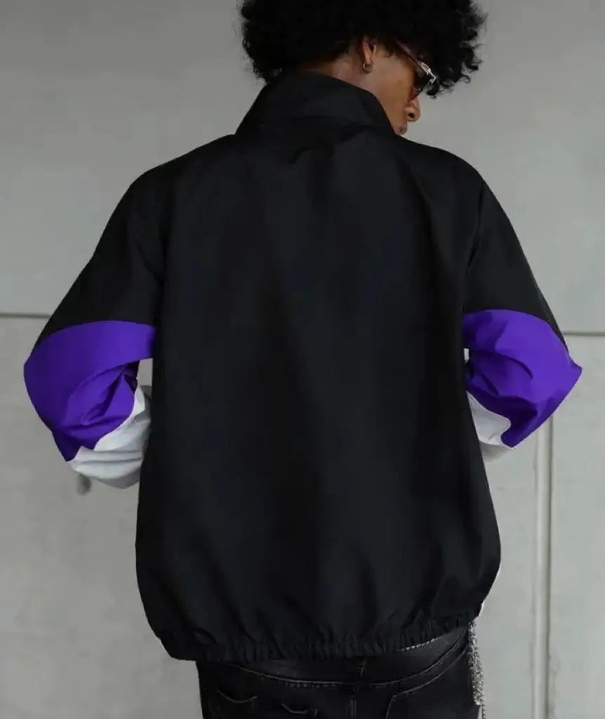 Simples Market men's color-blocked lightweight windproof jacket, black body with purple sleeves.