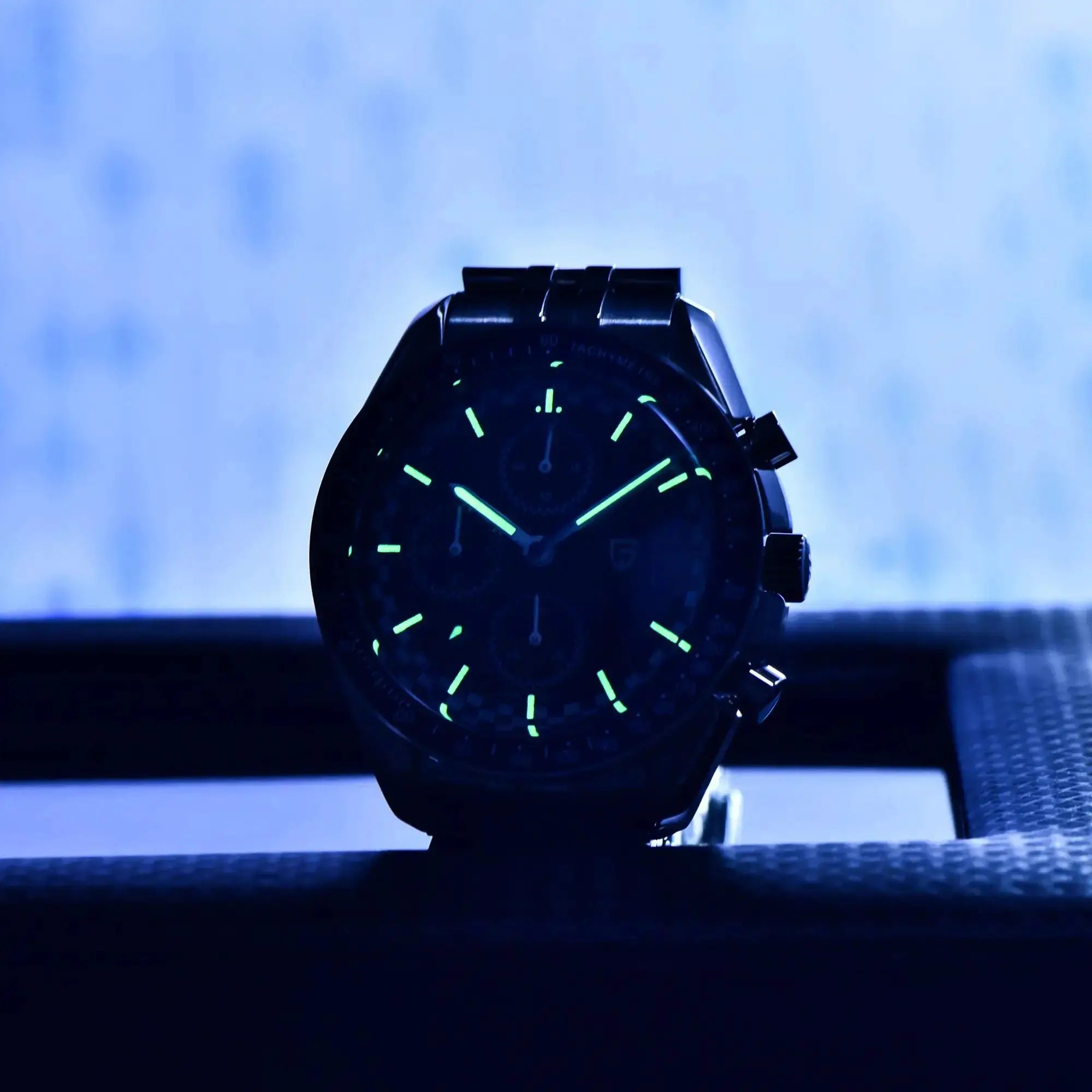 PAGANI DESIGN 2026 men's sport quartz chronograph watch with green luminous markers on a black steel bracelet