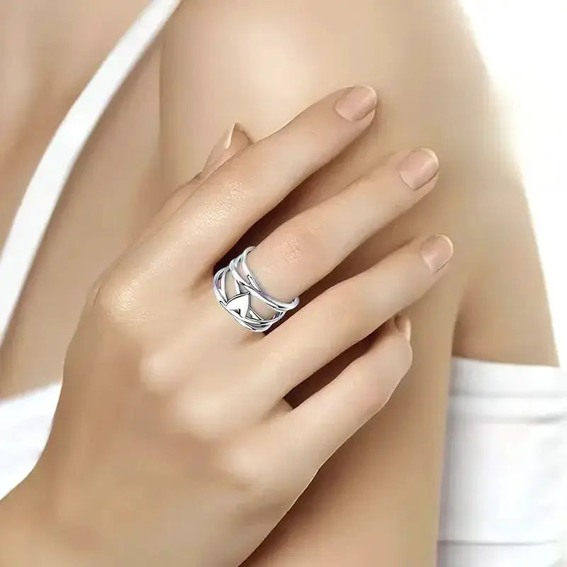 Ring, silver 925 sterling with a geometric multi-band design worn on the finger