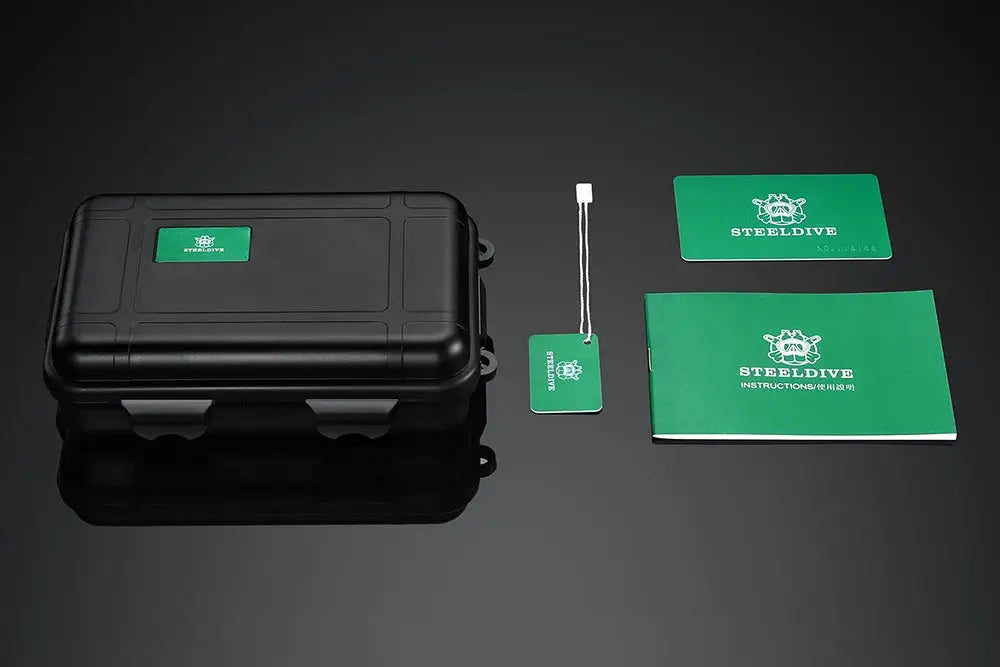 STEELFLIER SF752 watch packaging set; black case with green STEELDIVE card and manual