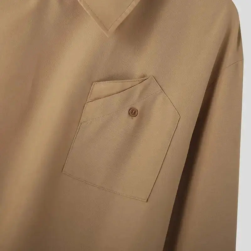 Beige men's long-sleeve shirt with buttoned chest pocket