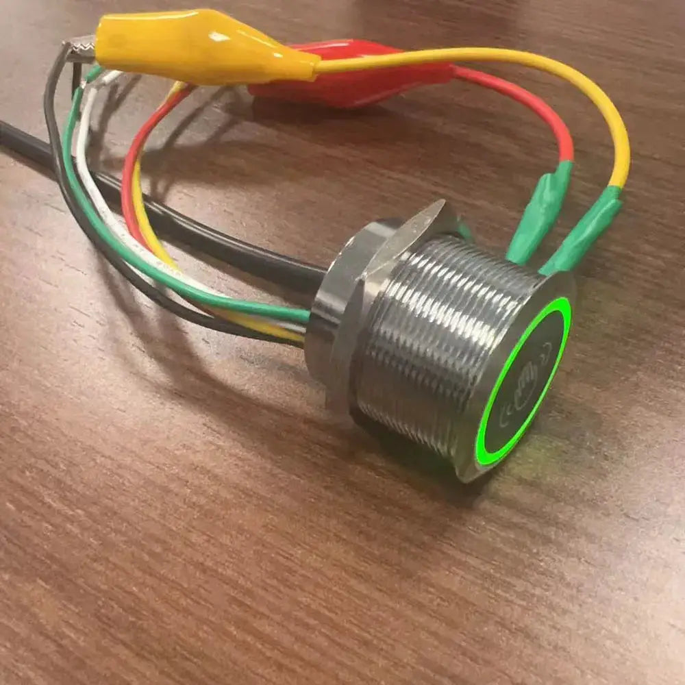 Infrared no-touch exit button by Simples Market with green LED ring, metal threaded housing and wired leads