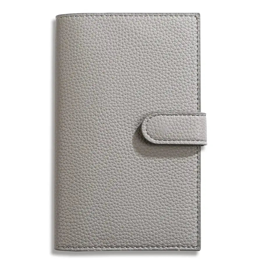 A6 Weekly Planner Notebook with pebble-grain gray leather cover and strap closure, Simples Market
