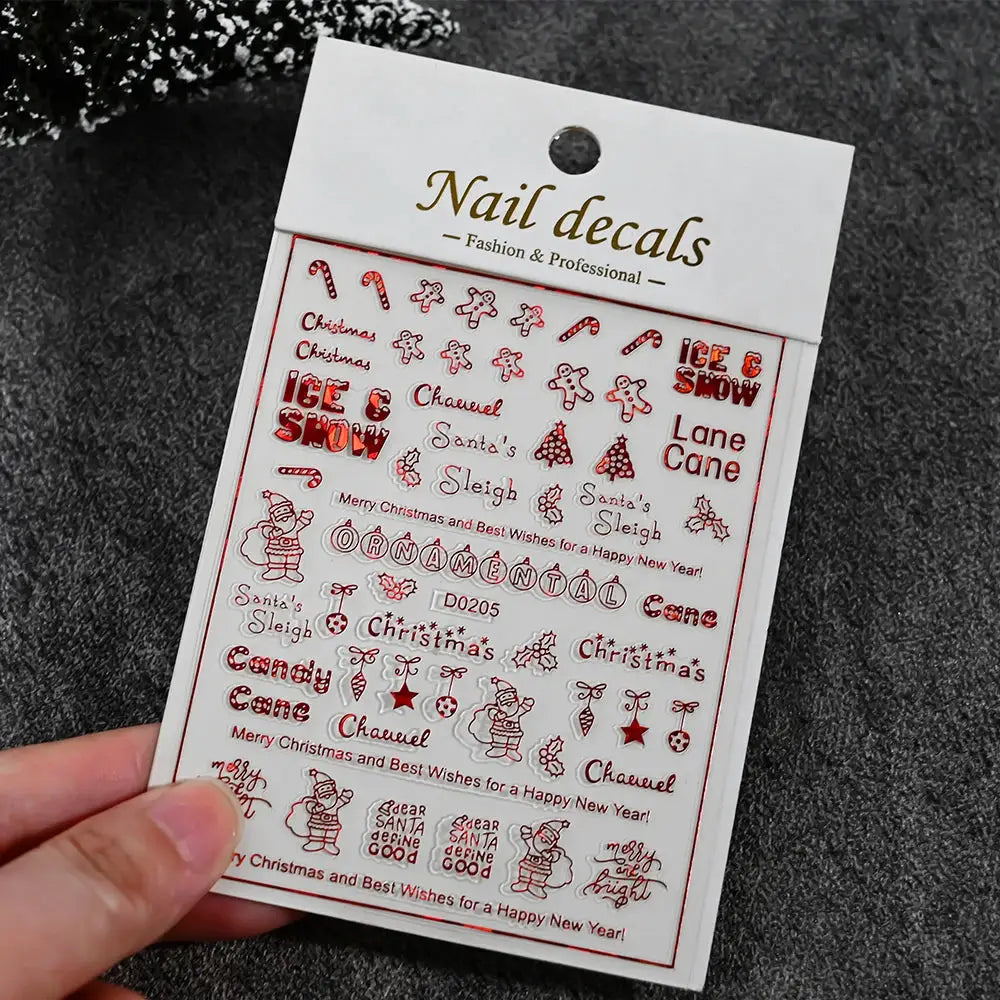 Winter Christmas nail decals sheet by Simples Market with snowman, snowflake and candy cane designs; self-adhesive.