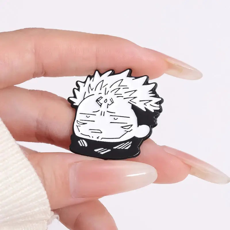 Cartoon anime enamel pin showing a white-haired, spiky character with a black outfit; compact lapel badge.