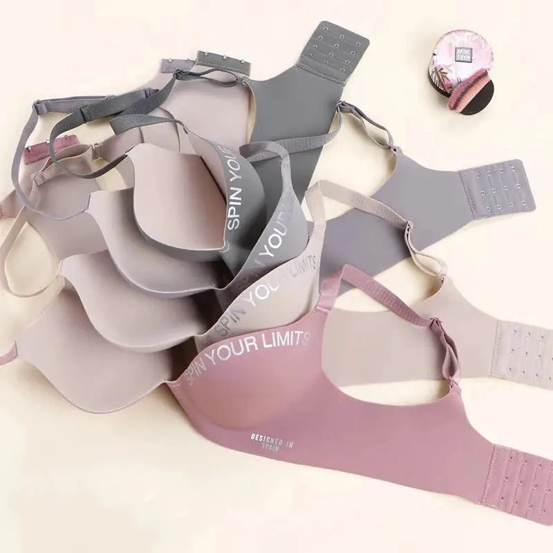 Simplicity letters-printed bralette set by Simples Market in pastel gray, beige, lavender, and pink; seamless cups, no underwire.