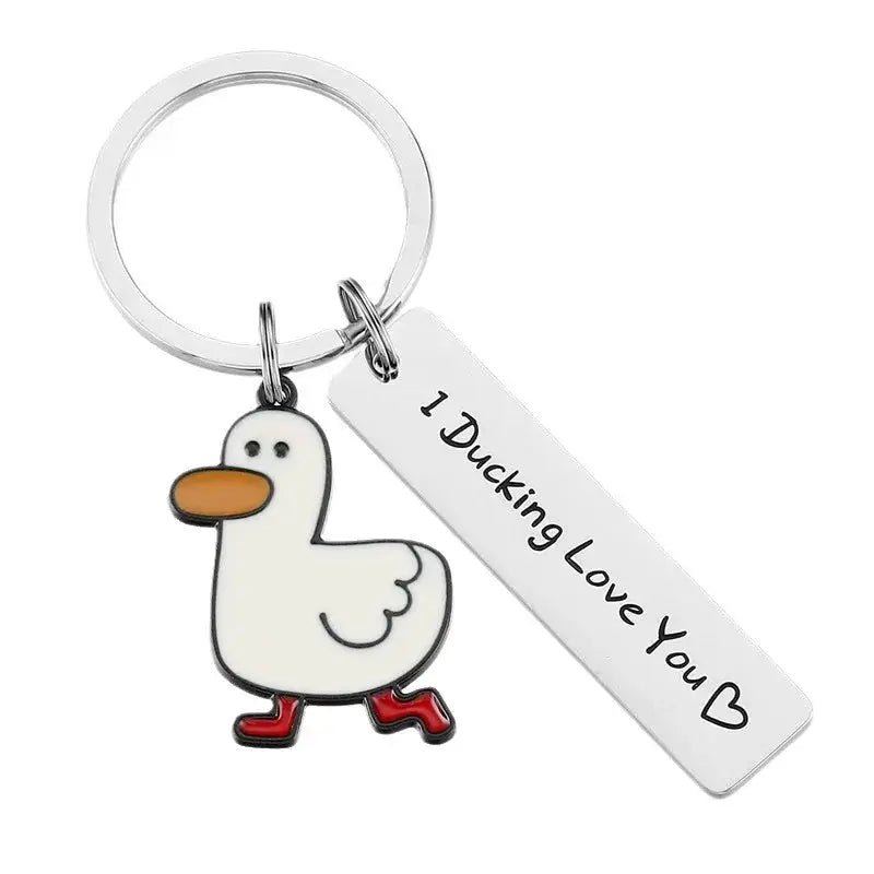 Funny duck pun keychain with white enamel duck charm and silver tag reading I Ducking Love You