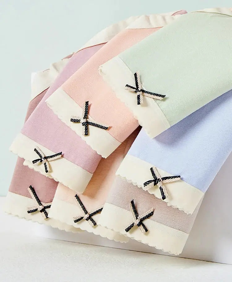 7-piece pastel cotton women's panties set with bow accents and lace trim