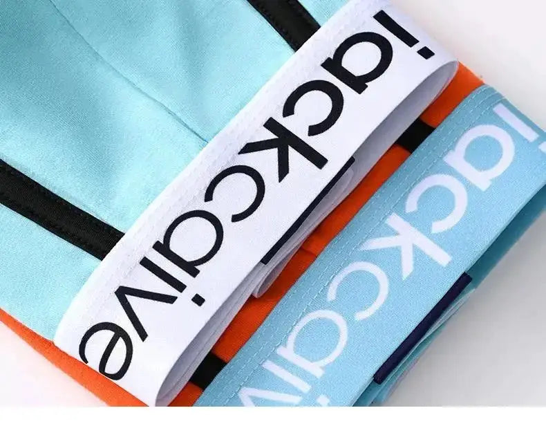 3-pack cotton men's boxers in turquoise, orange and light blue with elastic waistbands