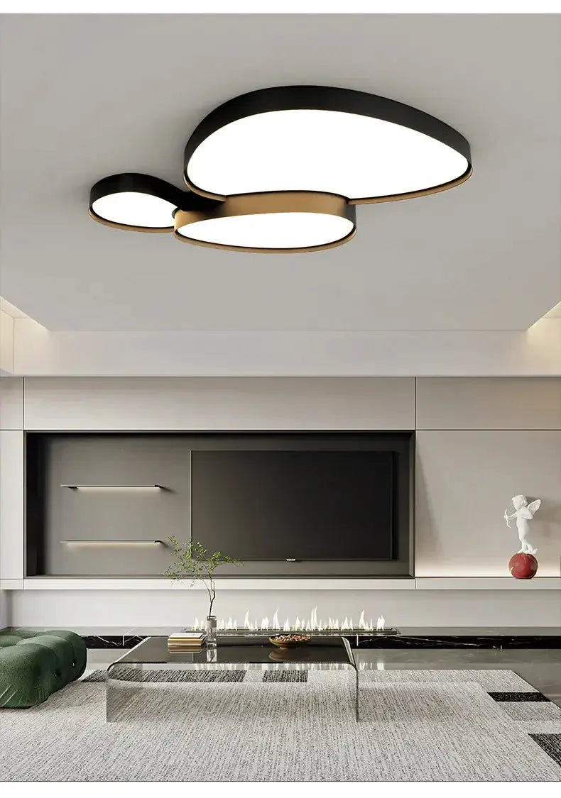LED ceiling lamp by Simples Market, modern three-ring design in black with white diffusers and gold trim, remote control