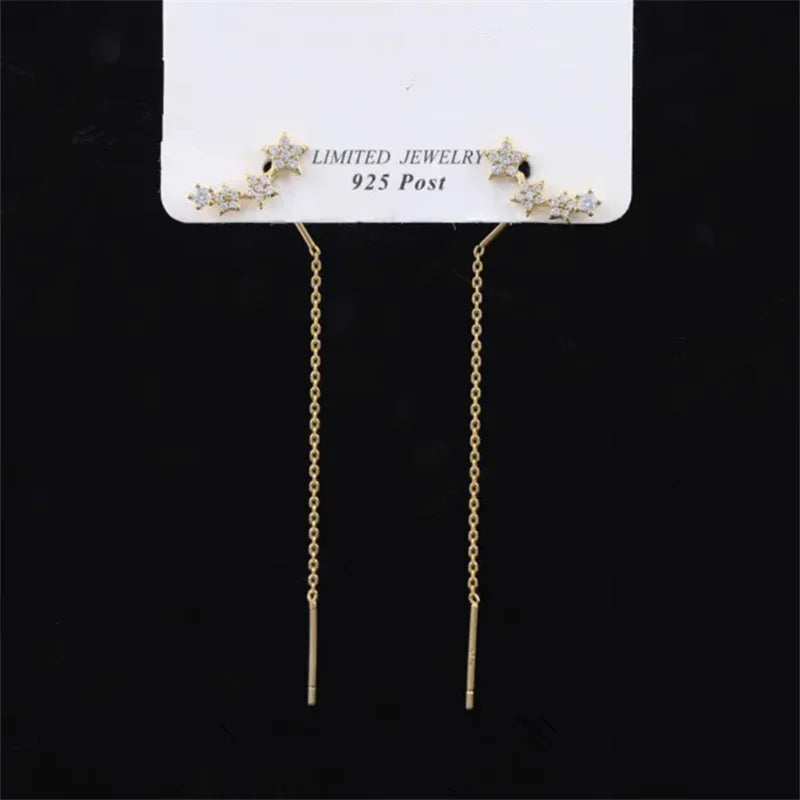 Simples Market gold-tone long threader earrings pair with bar drops and star-heart bead accents
